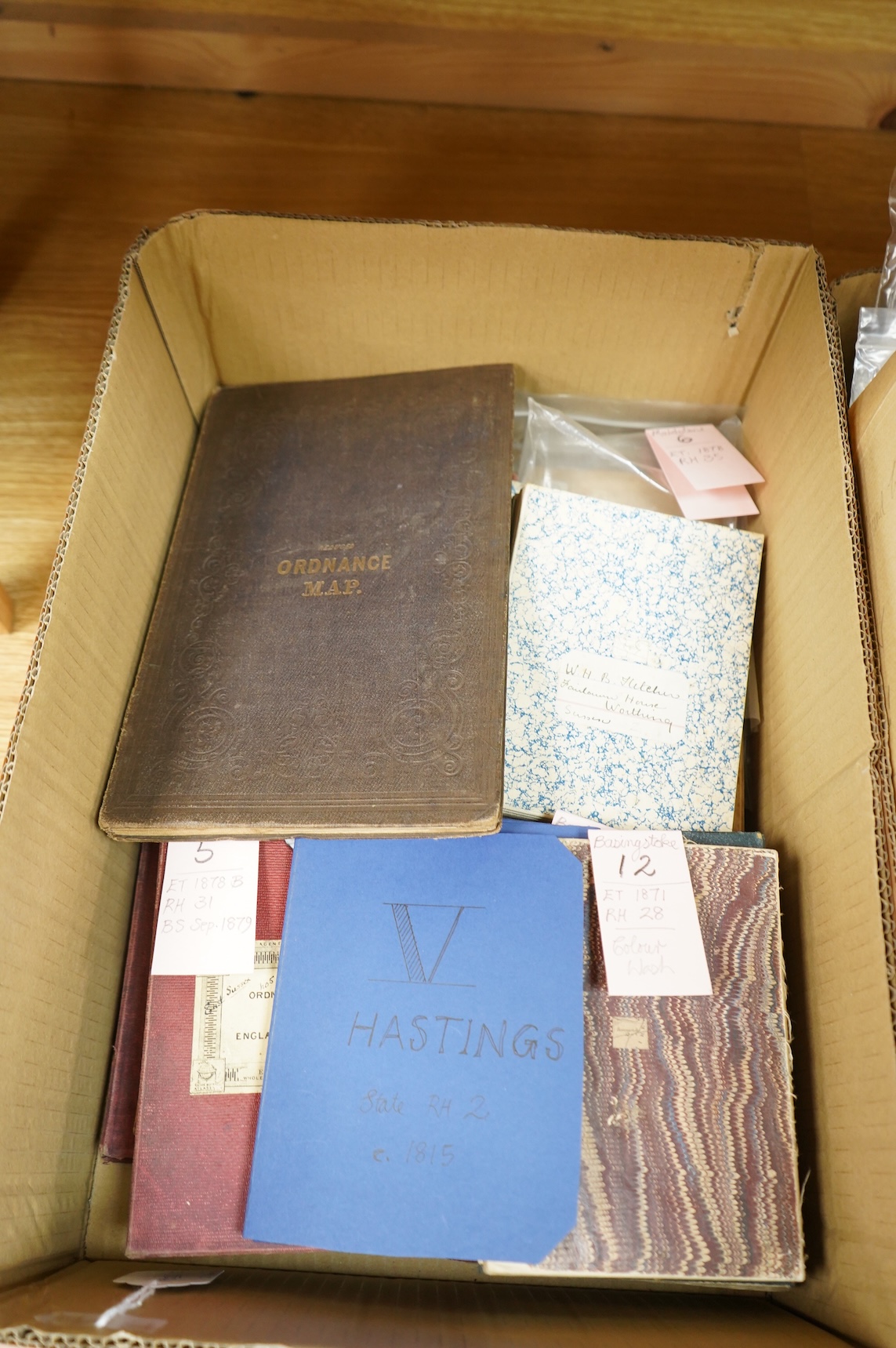 A collection of twenty-one late 19th century Ordnance Survey maps, many in slip cases, including the Revised New Series and Third Edition, areas covered include; Basingstoke, Hastings, Maidstone, Canterbury, Dorking, Sno